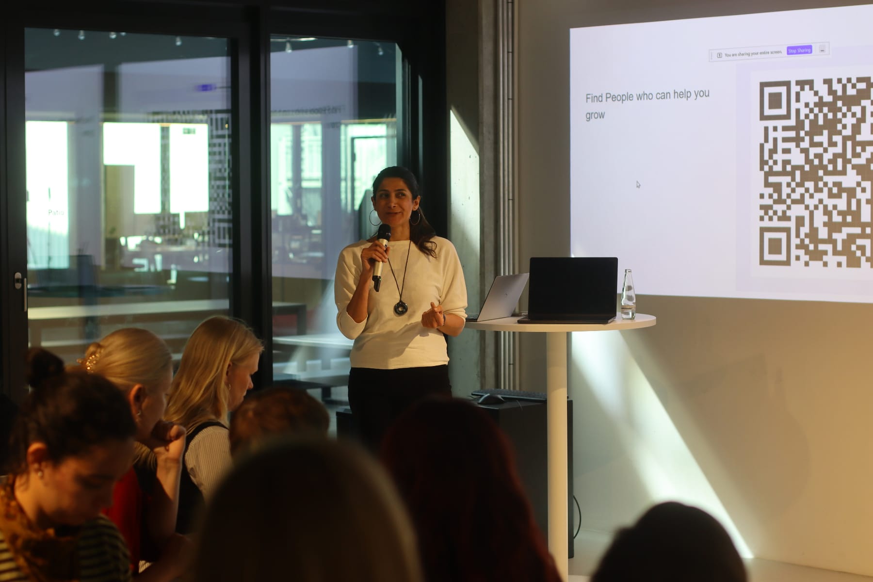 Maryam leading a corporate workshop